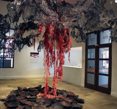 Utútu. Burlap, cheesecloth, wire, paper, jute rope, wax and dye. 2017