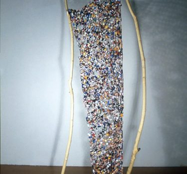 Cloth I. Magazine pages and wood. 2003