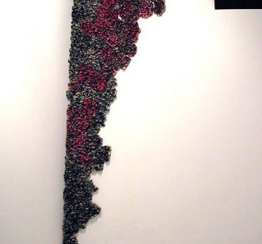 Invasion. Magazine pages and wax. 2005