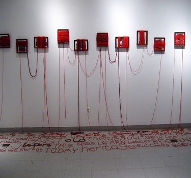 Lost Memories. Framed photographs and yarn. 2007