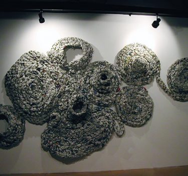 Matted. Newspapers and string. 2004