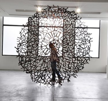 Onwa N'etilu Ora. Newspapers and acrylic. 2013