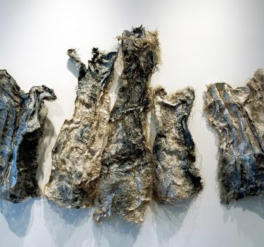 Picking Up the Pieces. Burlap, handmade paper, dye and acrylic. 2011