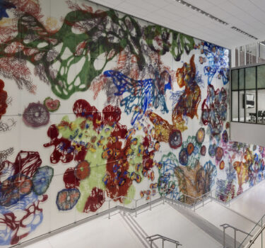 Title: an ætiology of things Materials: Hand-painted ceramic pigments and etched glass Dimension: 43 feet by 140 feet Year: 2026