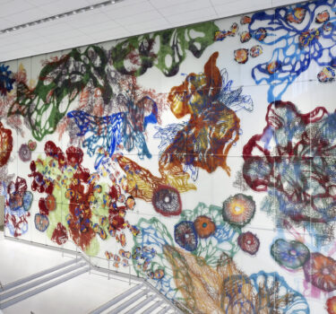 an ætiology of things. Hand-painted ceramic pigments on etched glass. 43'x140'. 2026